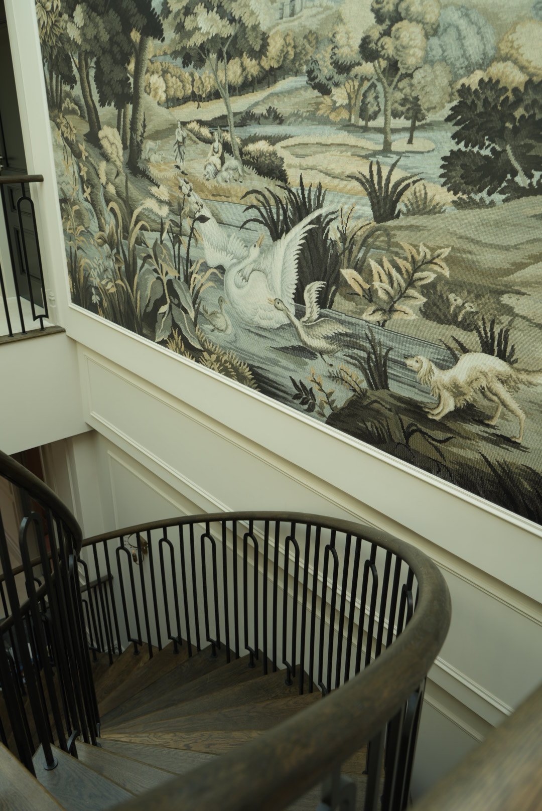 Swans in the reeds, seen from the stair