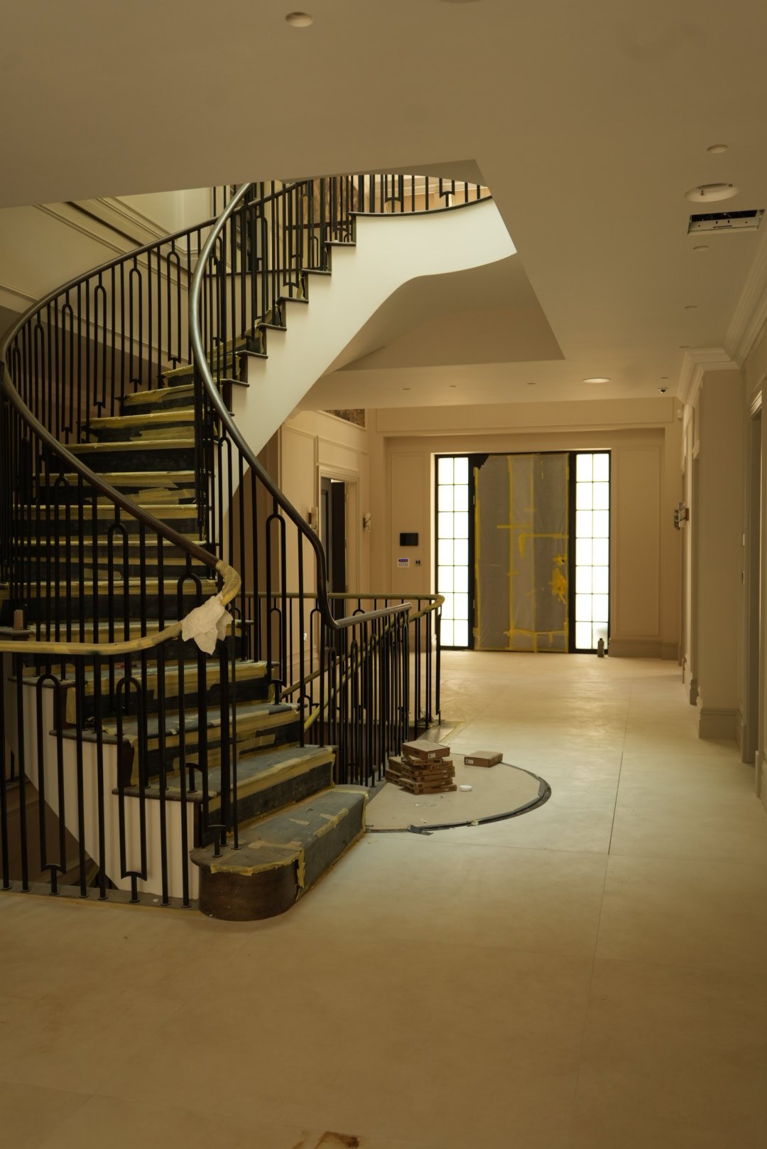 The staircase rising from the entrance hall