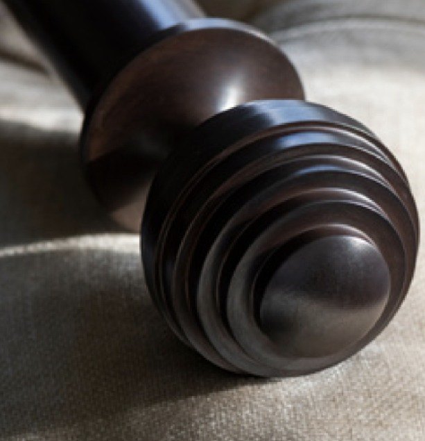 A turned bronze finial