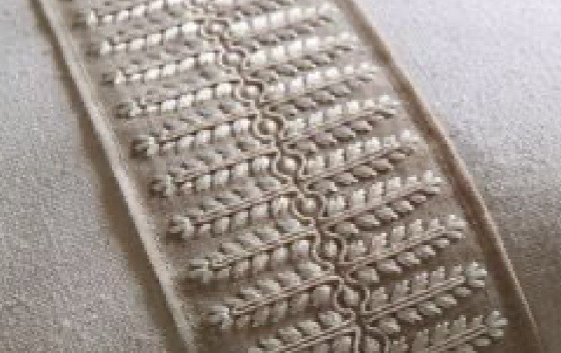 An embroidered linen border