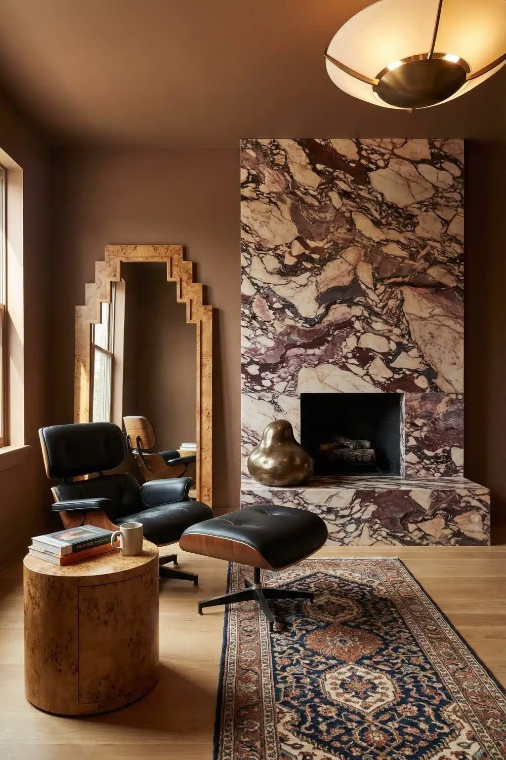 A full height chimney breast in violet veined marble