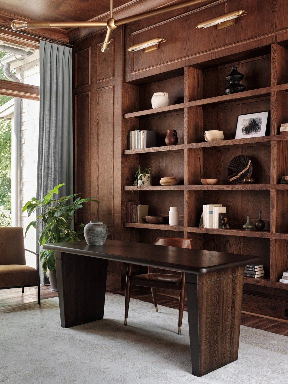 A generous desk in dark timber