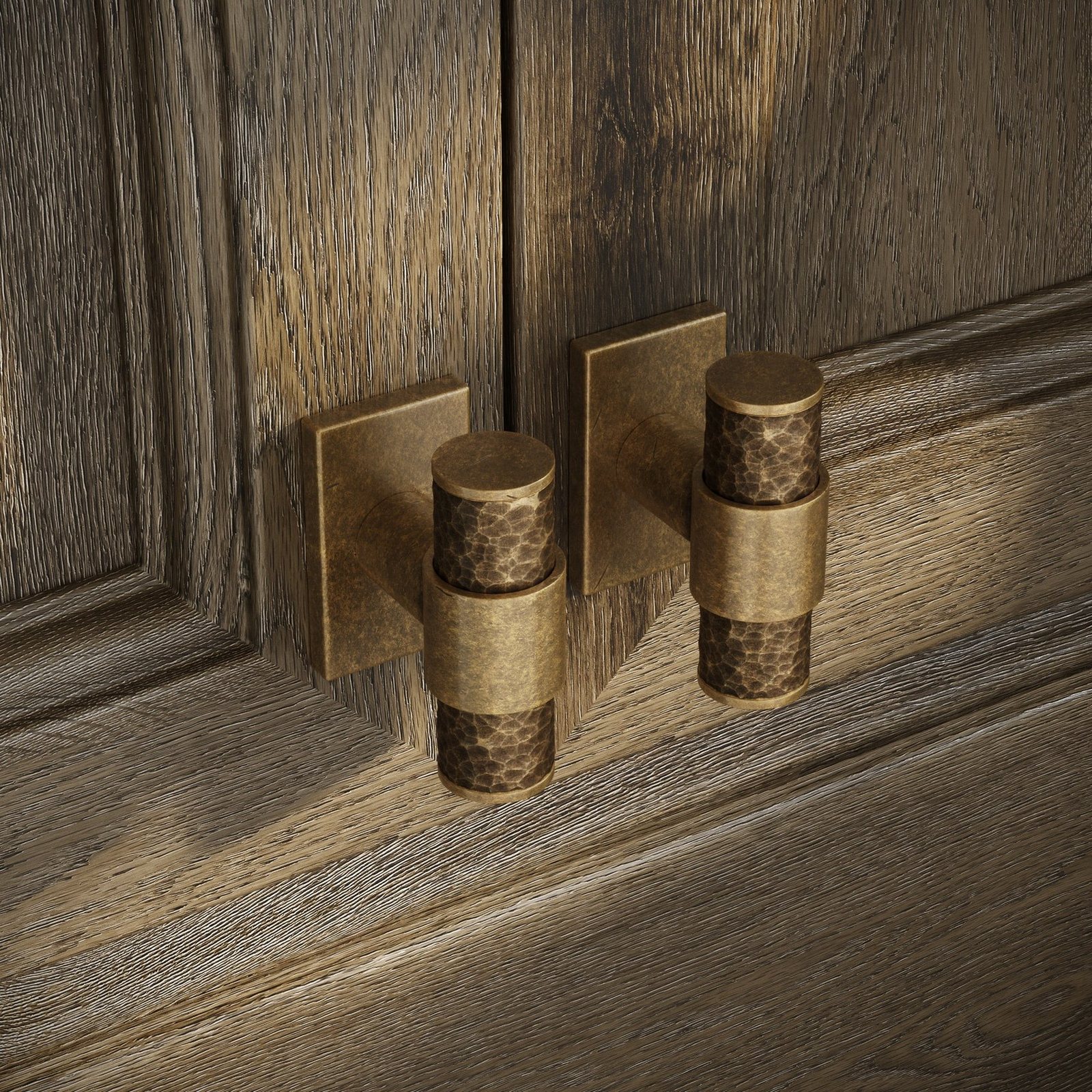 Hammered bronze knobs on oak
