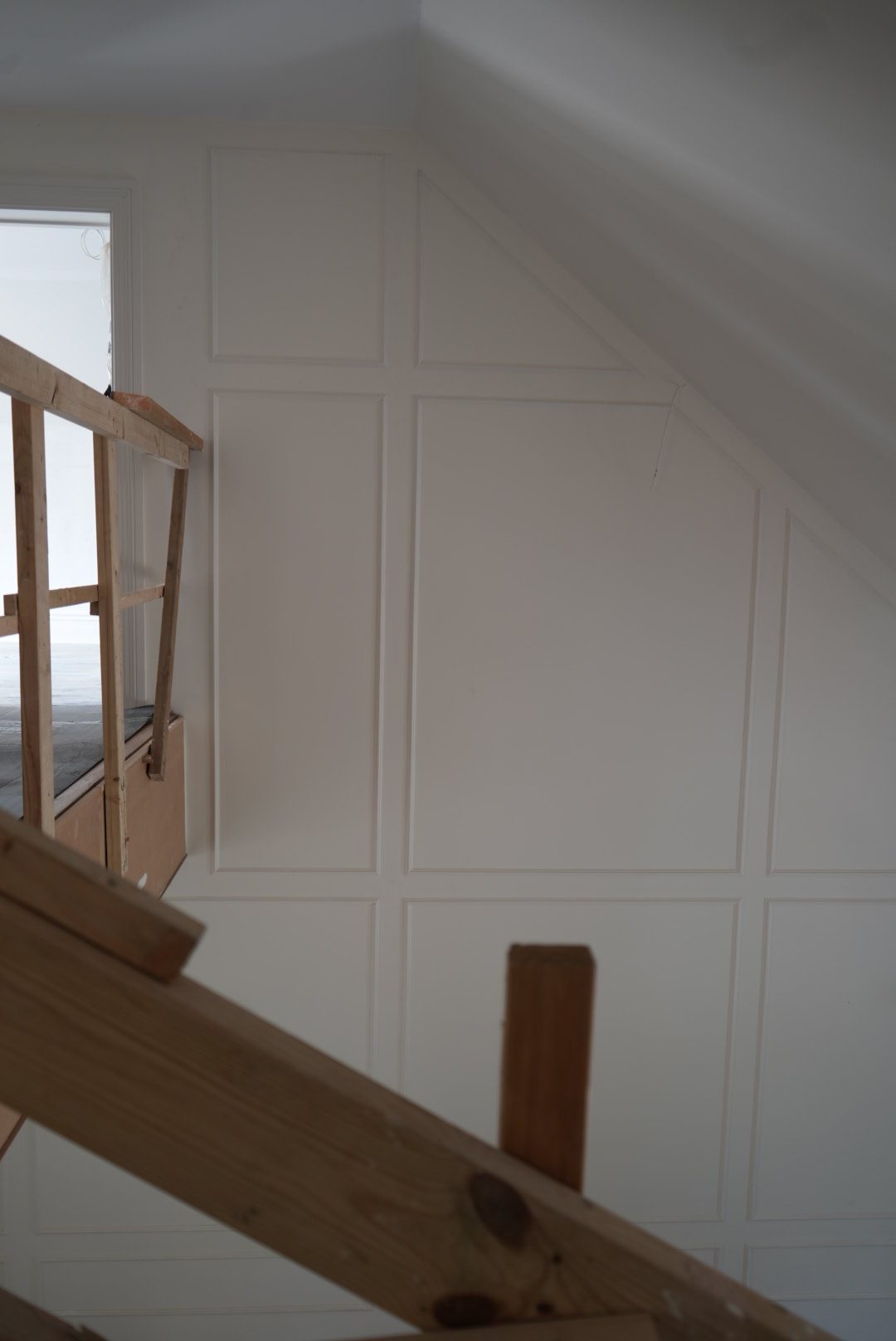 Completed wall panelling awaiting decoration at the Tewin Family Home